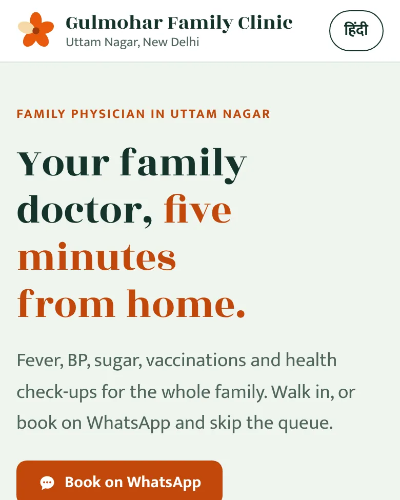 Gulmohar Family Clinic example homepage on a phone
